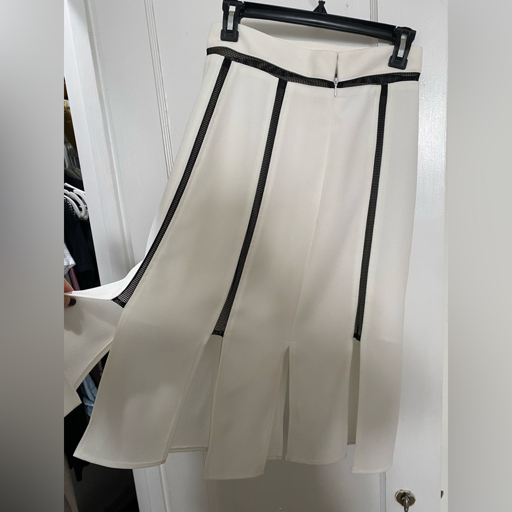 ABS knee length skirt with slits all around